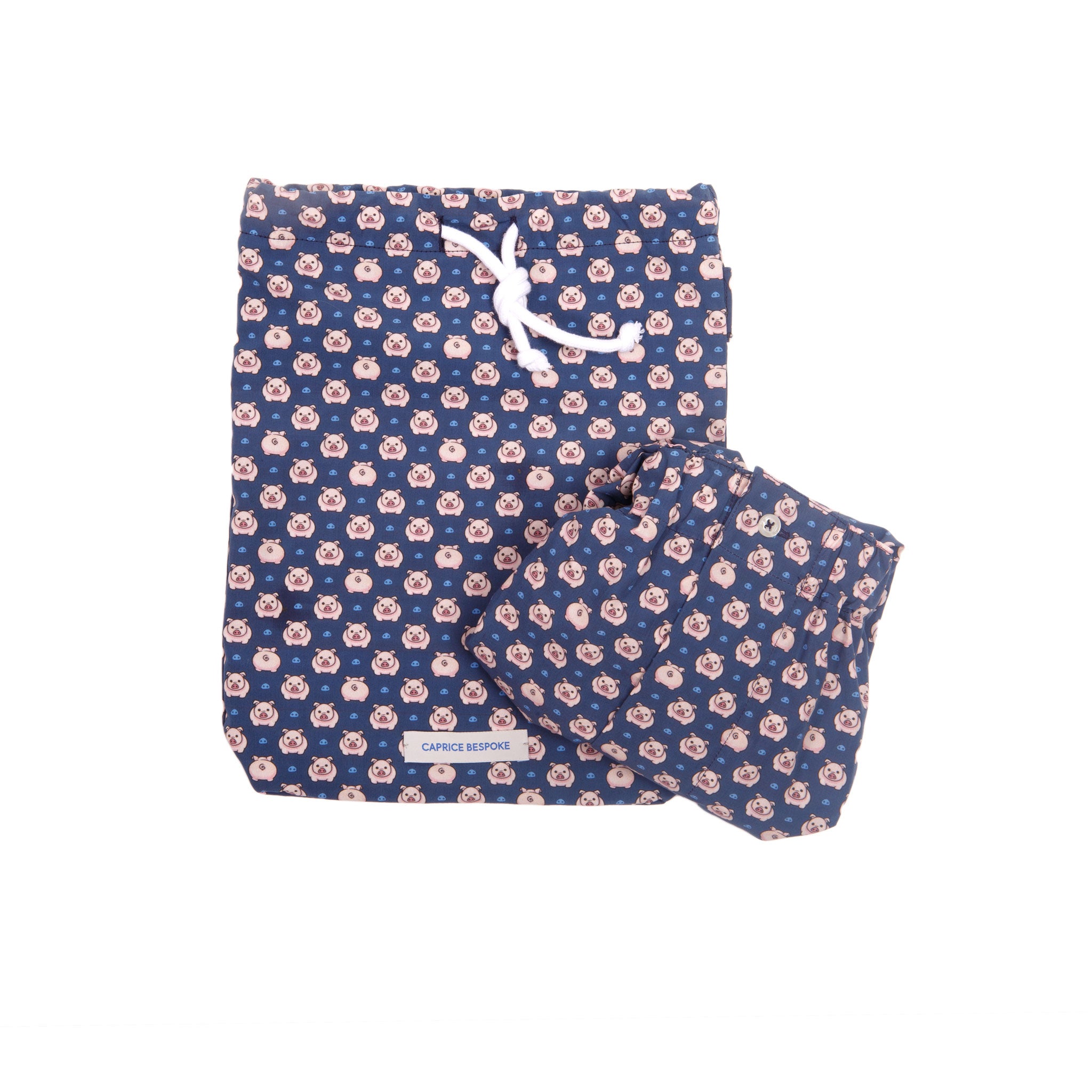 Boxer con sacco da boxe con maialini